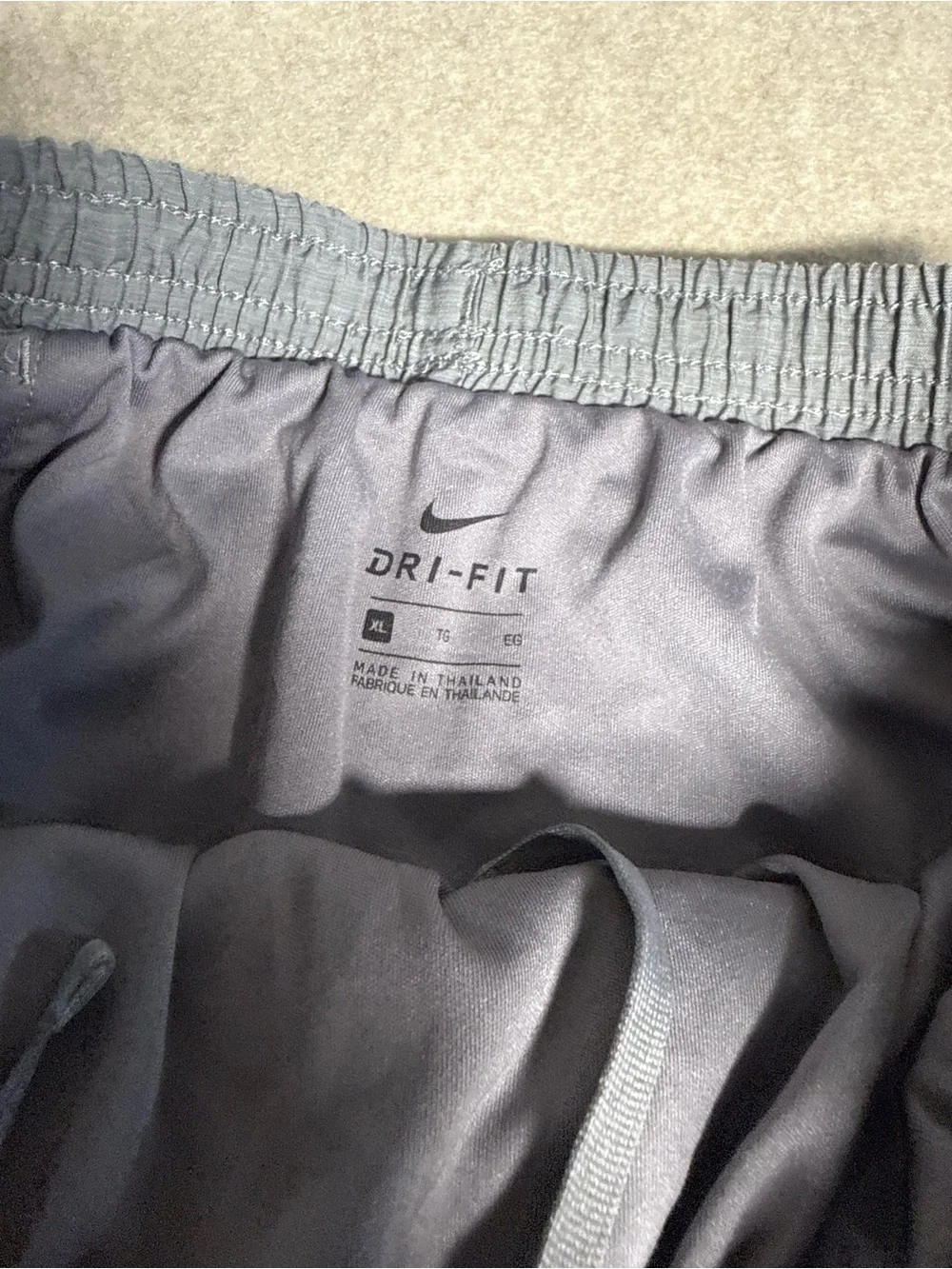 Nike Grey Athletic Shorts with White Swoosh